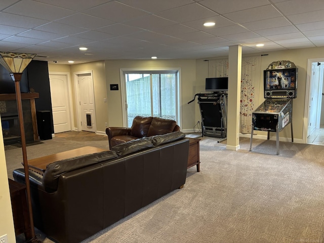 carpeted living room featuring a fireplace