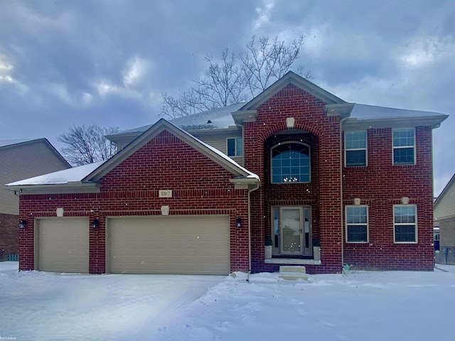 view of front of property featuring a garage