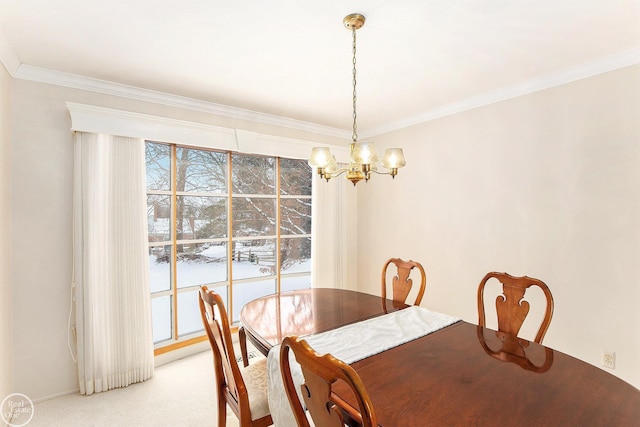 carpeted dining room featuring ornamental molding and a notable chandelier