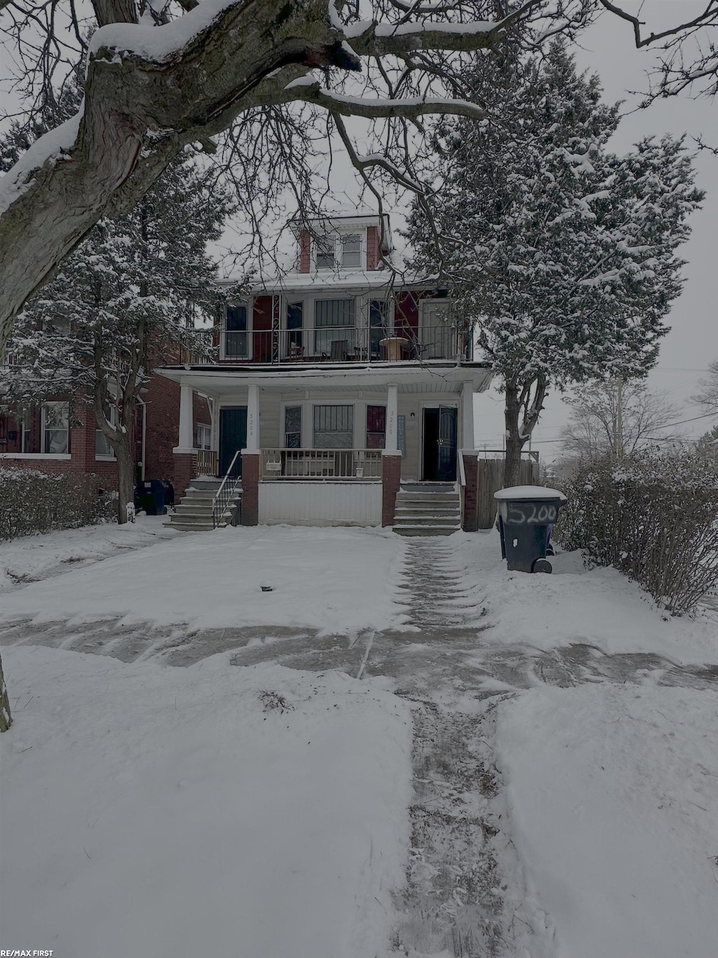 view of property with a balcony