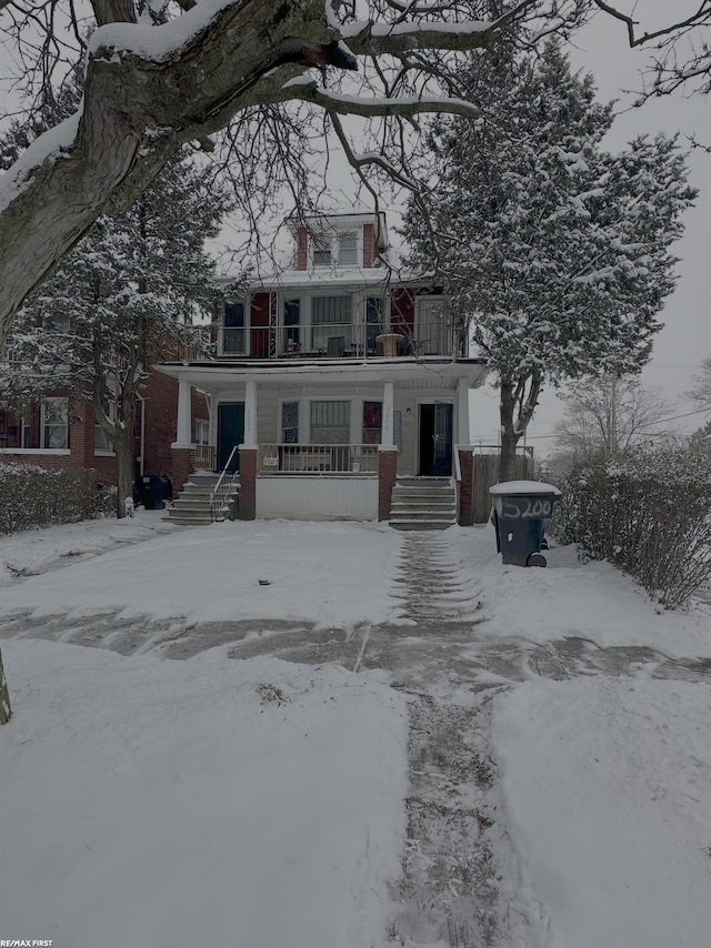 view of property with a balcony