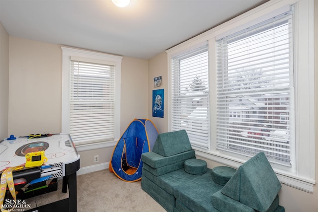 interior space featuring light colored carpet