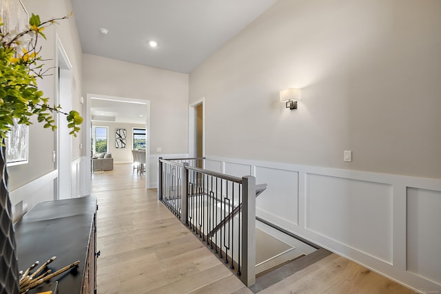 hall with light hardwood / wood-style floors