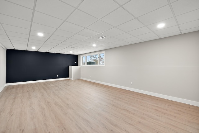 basement featuring light hardwood / wood-style floors