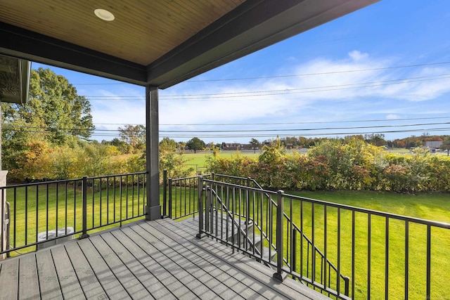 deck featuring a lawn