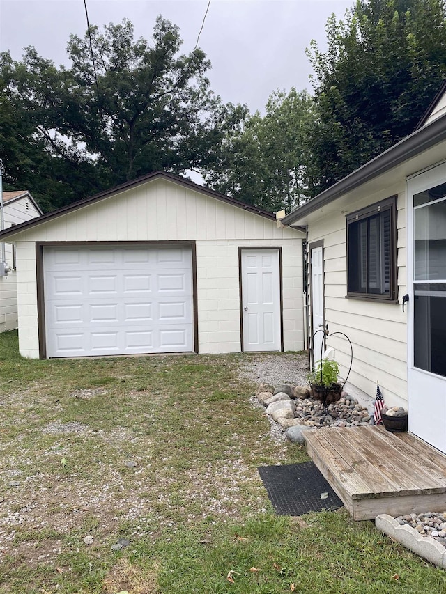 garage with a yard