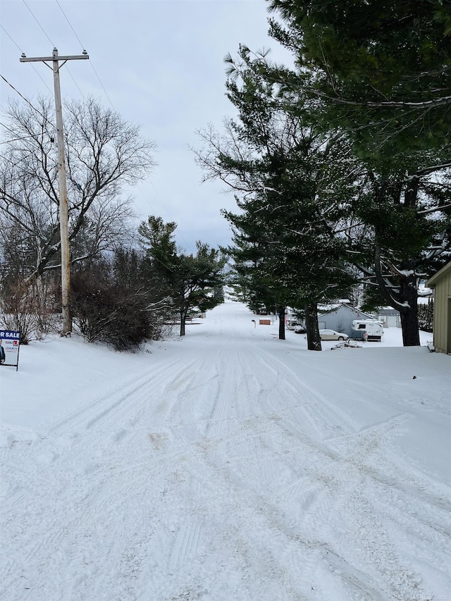 view of yard layered in snow