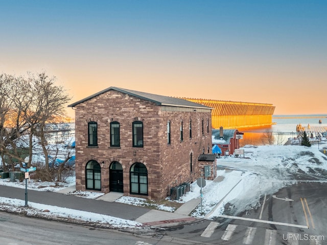 view of front of house with central air condition unit