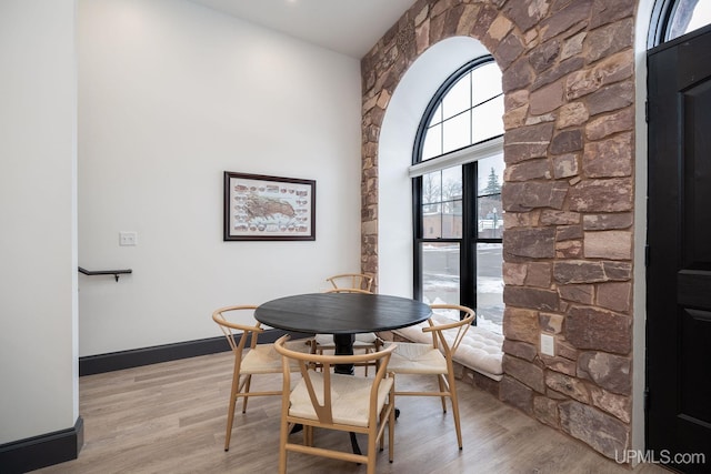 dining space featuring light hardwood / wood-style flooring