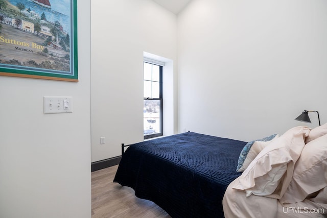 bedroom with light hardwood / wood-style flooring