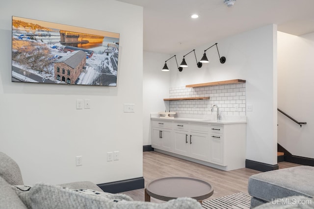 interior space featuring light hardwood / wood-style floors and sink