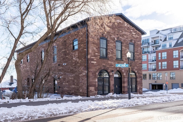 view of snow covered building