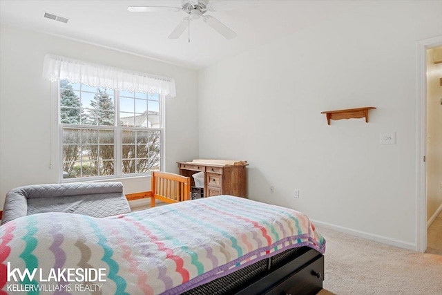 bedroom with ceiling fan and carpet floors