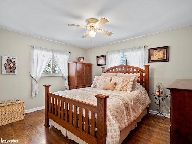 bedroom featuring ceiling fan and dark hardwood / wood-style floors