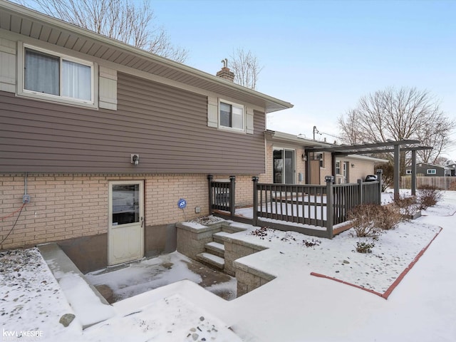 view of snow covered property