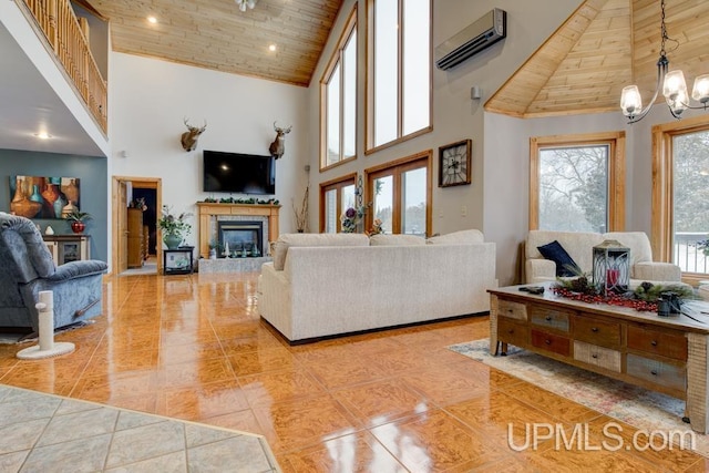 tiled living room with a notable chandelier, wood ceiling, a wall mounted air conditioner, and high vaulted ceiling