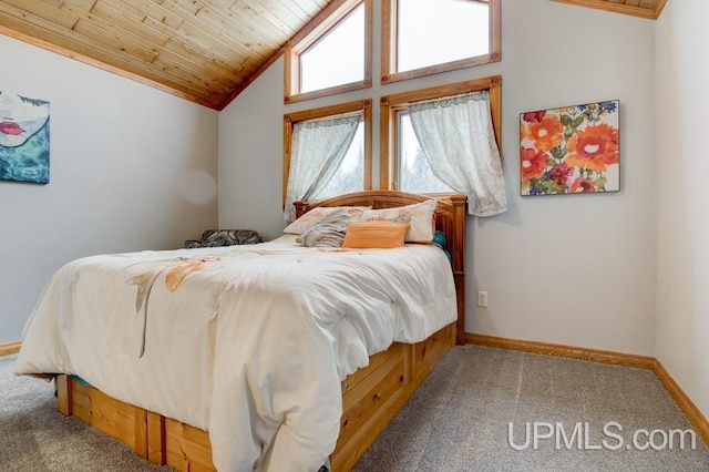 bedroom featuring carpet flooring, vaulted ceiling, and wooden ceiling