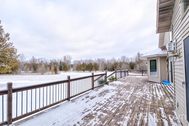 view of snow covered deck