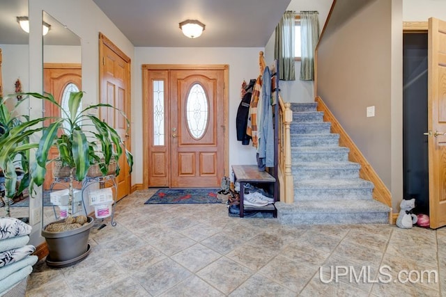 entrance foyer featuring a healthy amount of sunlight