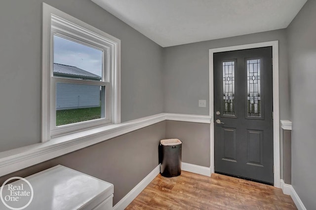 foyer with light hardwood / wood-style floors