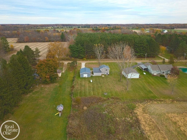 birds eye view of property featuring a rural view