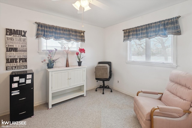 sitting room with light carpet and ceiling fan