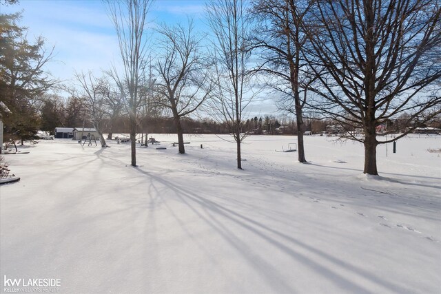 view of snowy yard