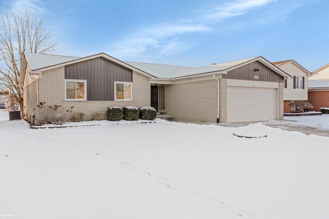 single story home with a garage