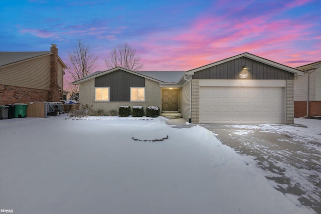 single story home with a garage