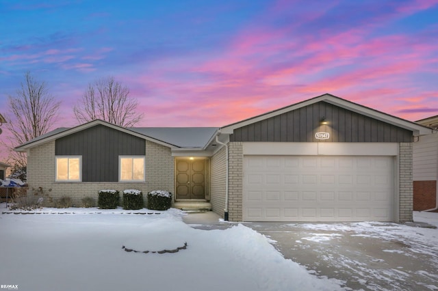 single story home with a garage