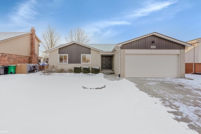 single story home featuring a garage