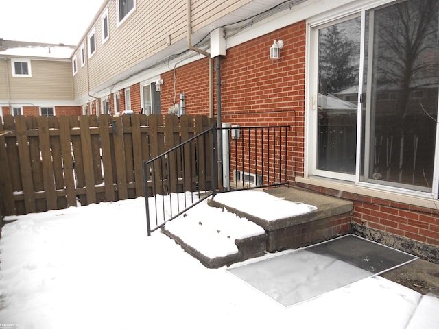 view of snow covered patio