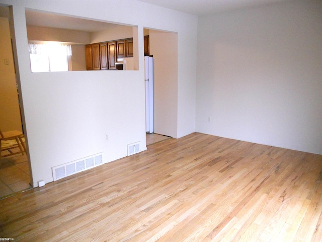 empty room featuring light hardwood / wood-style floors