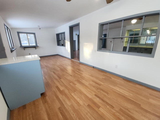 unfurnished living room with light hardwood / wood-style floors