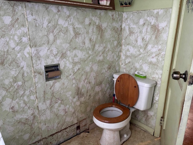 bathroom featuring toilet