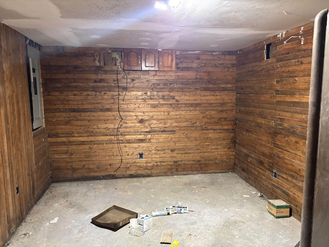 basement with wood walls