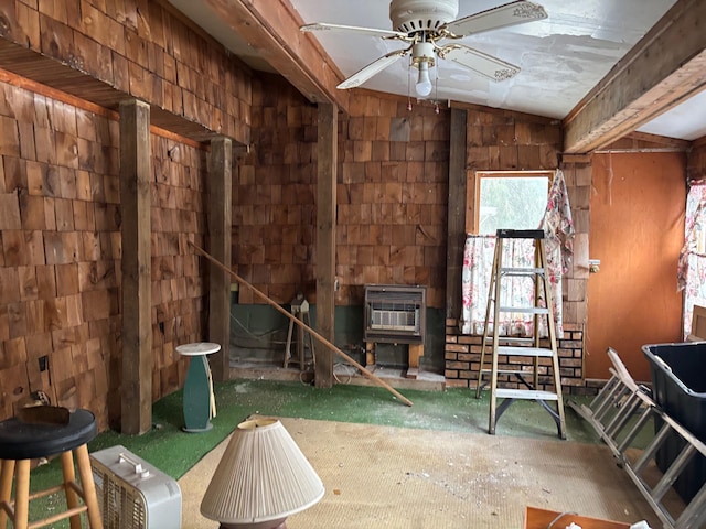 misc room featuring ceiling fan, lofted ceiling with beams, and heating unit