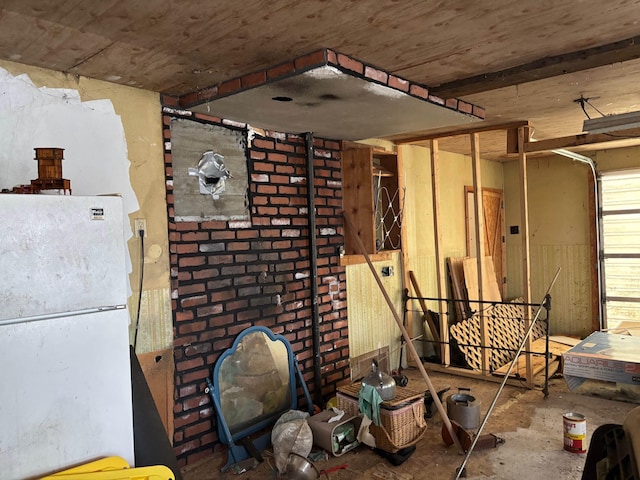 garage with white fridge