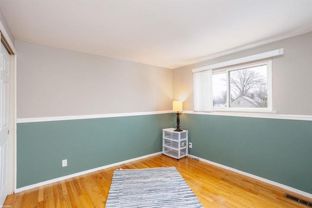 interior space with hardwood / wood-style floors