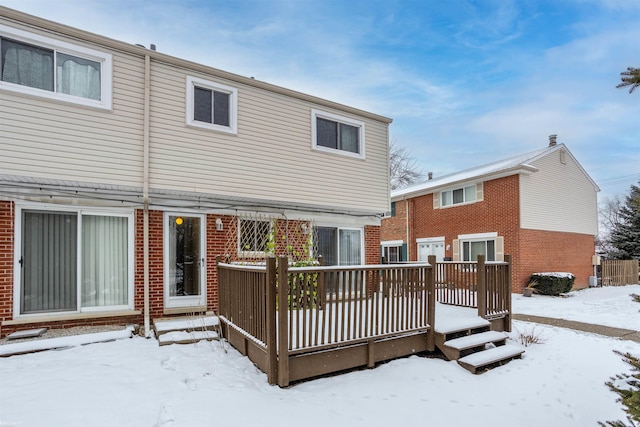 view of snow covered property