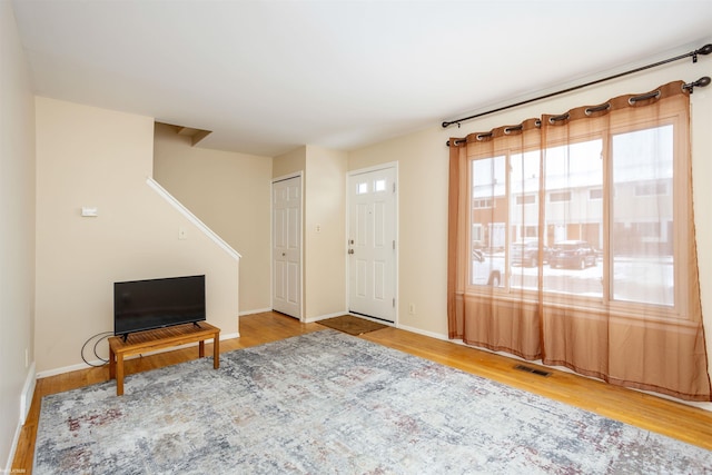 entrance foyer with hardwood / wood-style flooring