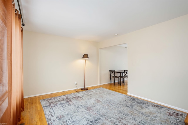 empty room with light hardwood / wood-style floors