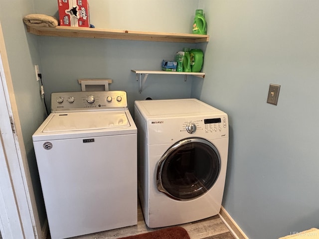 washroom with washer and clothes dryer