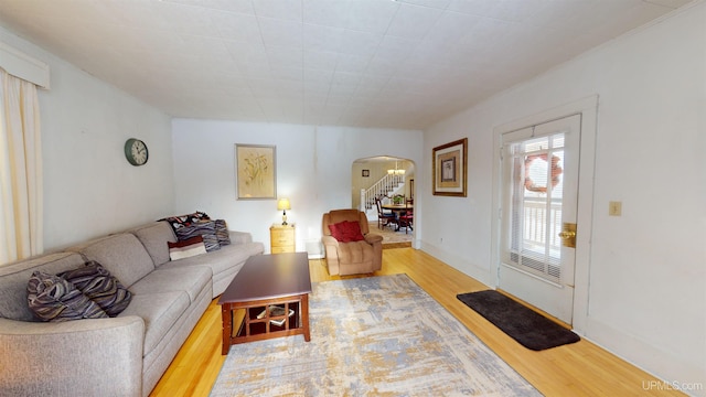 living room with light hardwood / wood-style flooring