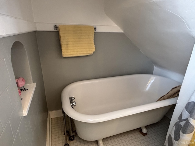 bathroom with a tub