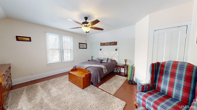 bedroom featuring vaulted ceiling, ceiling fan, and hardwood / wood-style floors