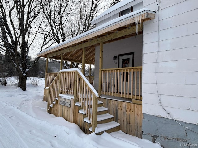 view of snow covered deck