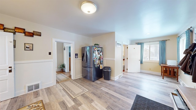 foyer with light hardwood / wood-style floors