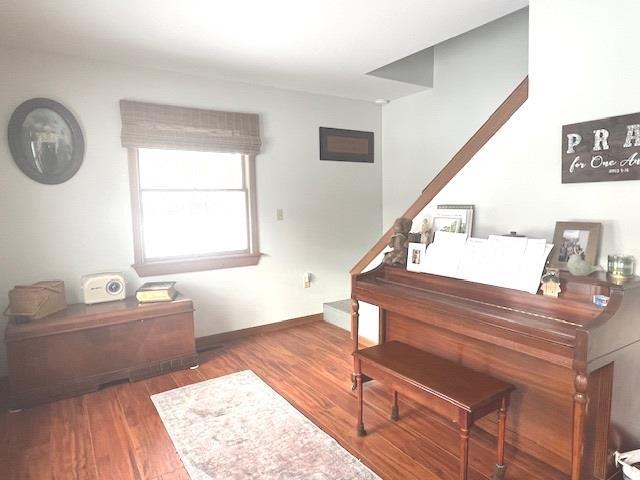 misc room with dark hardwood / wood-style flooring