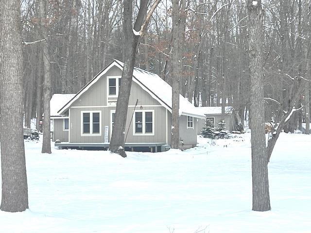 view of snow covered property